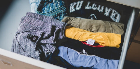 A Drawer full of T-Shirts in Various Designs