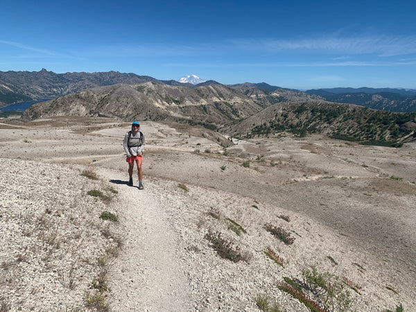 Trail runners near Mt. St. Helens and Mt. Adams