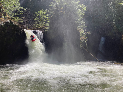 Packrafter paddling over Split Falls on the Salmon River Gorge in Oregon