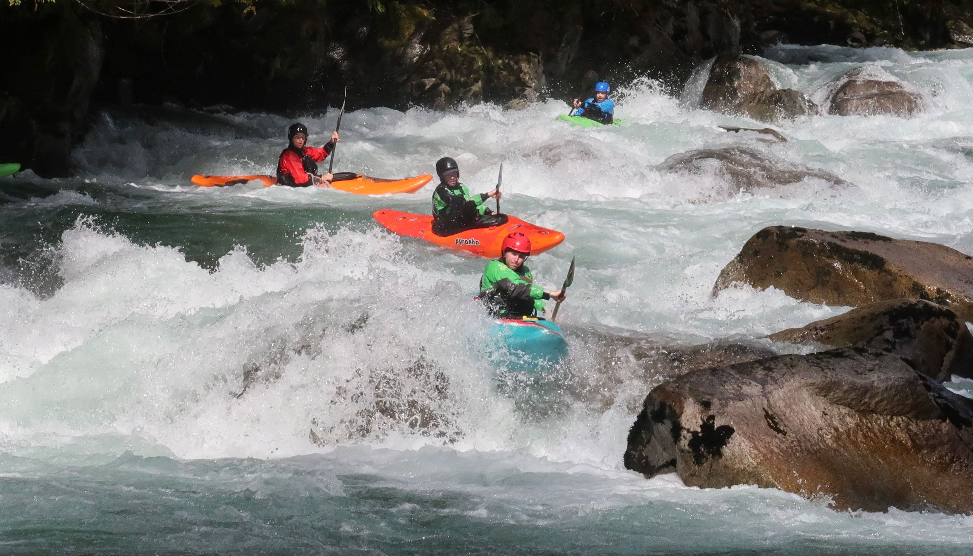 Casey boofing the bottom rapid on the Cascade River.