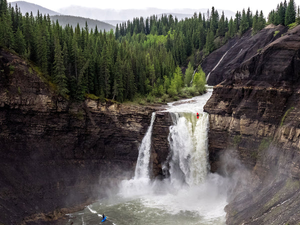 A kayaker descends Rams Falls, Alberta