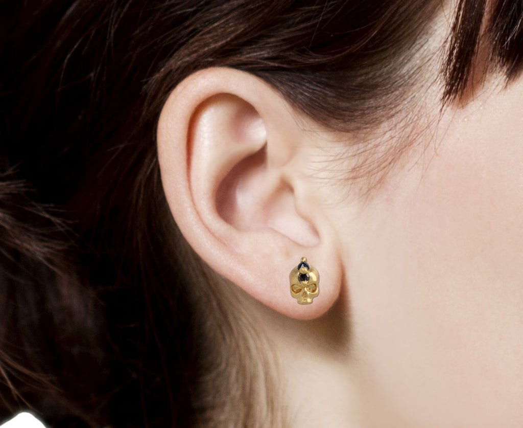 Polly Wales Black Sapphire and Diamond Island of Idols Skull Stud Earrings Close Up Profile