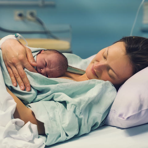 New mom holding newborn