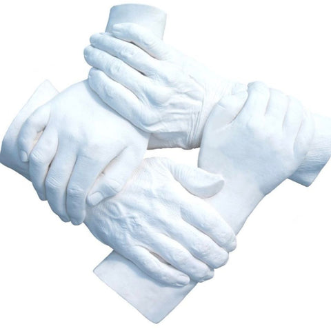 sculpture of four hands