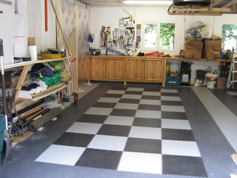A garage with Garage Floor Tile Company tiles in
