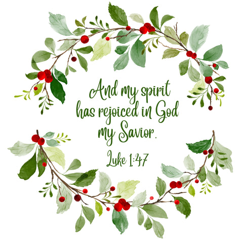 The words "And my spirit has rejoiced in God my Savior, Luke 1:47" surrounded by a wreath