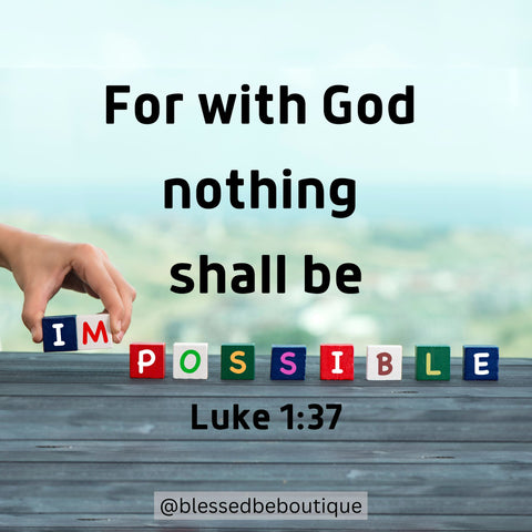 Image of a hand setting blocks that spell out the word "impossible" with the words "For with God nothing shall be impossible. Luke 1:37"