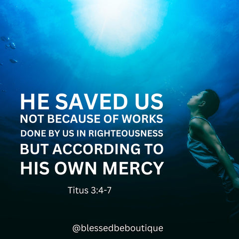 Image of a boy swimming deep in water with the words "He saved us not because of works done by us in righteousness, but according to his own mercy. Titus 3:5"