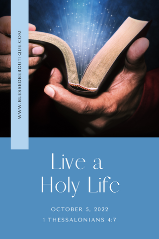 Image of a pair of hands opening a bible with light coming out of it and the words "live a holy life, 1 thessalonians 4:7, october 5, 2022"