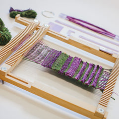 Double cloth weaving to create tubes using colour and texture