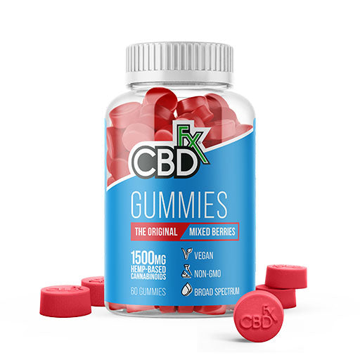 A jar of CBDfx Mixed Berry Gummies with several individual gummies around it. The CBDfx logo is visibly imprinted on the gummy.