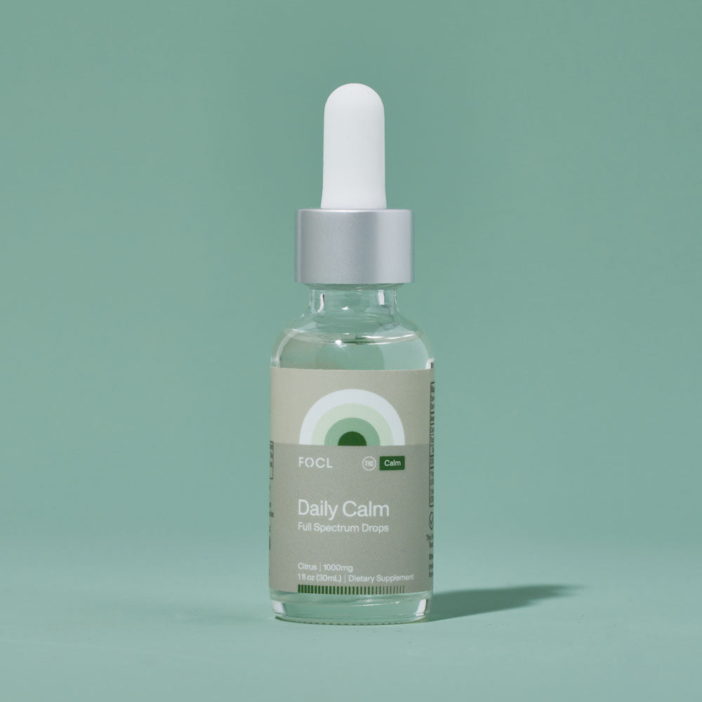 a bottle dropper of FOCL Daily Calm Full Spectrum Drops