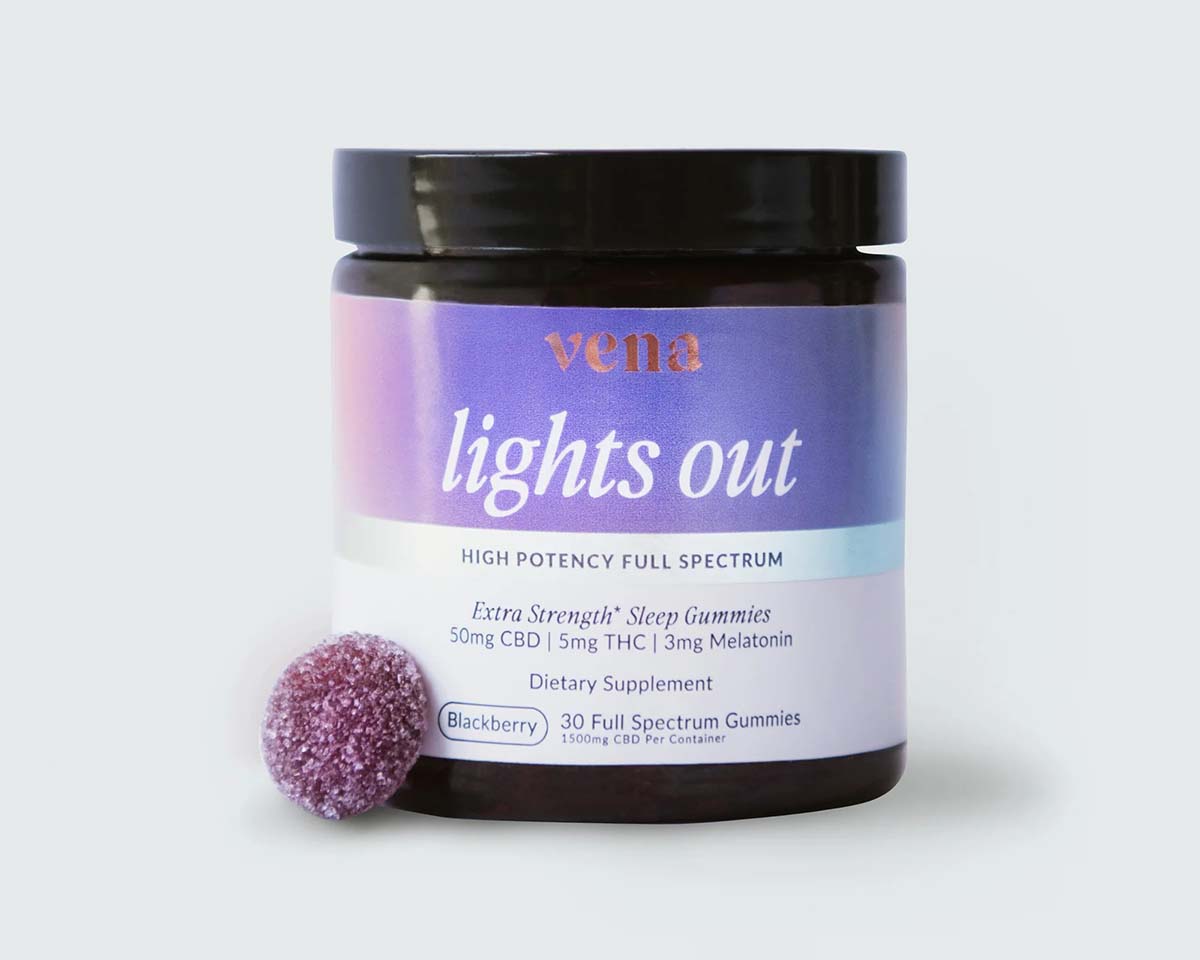a jar of Vena Lights Out Extra Strength Sleep Gummies beside a purple gummy