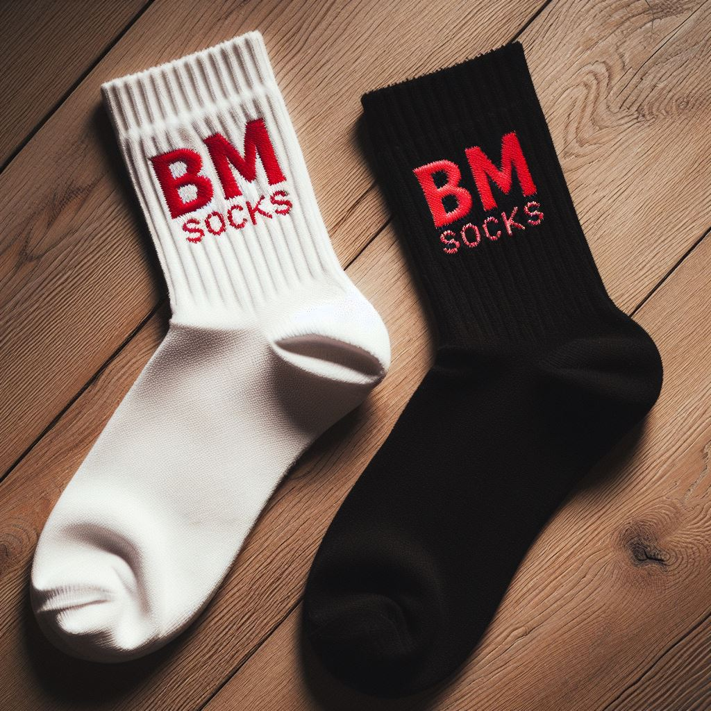 Two custom socks: one black and the other white, are lying on the floor.