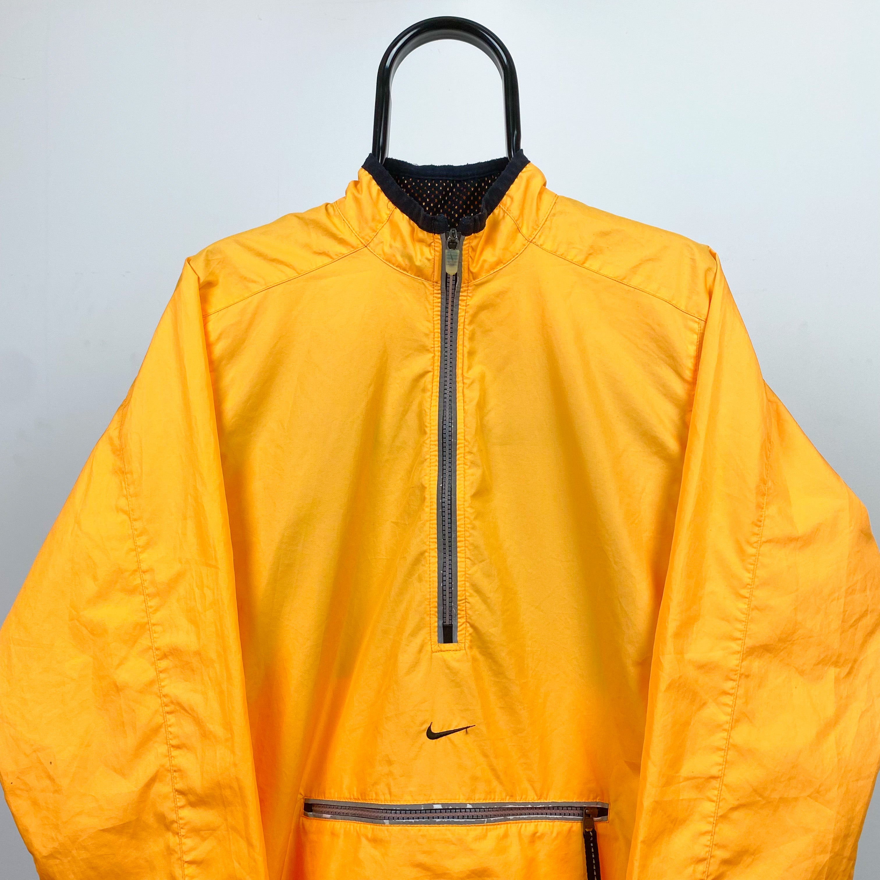 orange and yellow nike windbreaker