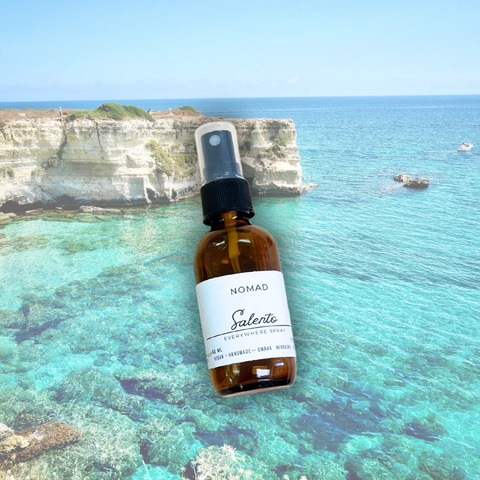 Salento travel spray over a background of the turquoise sea in Puglia, Italy