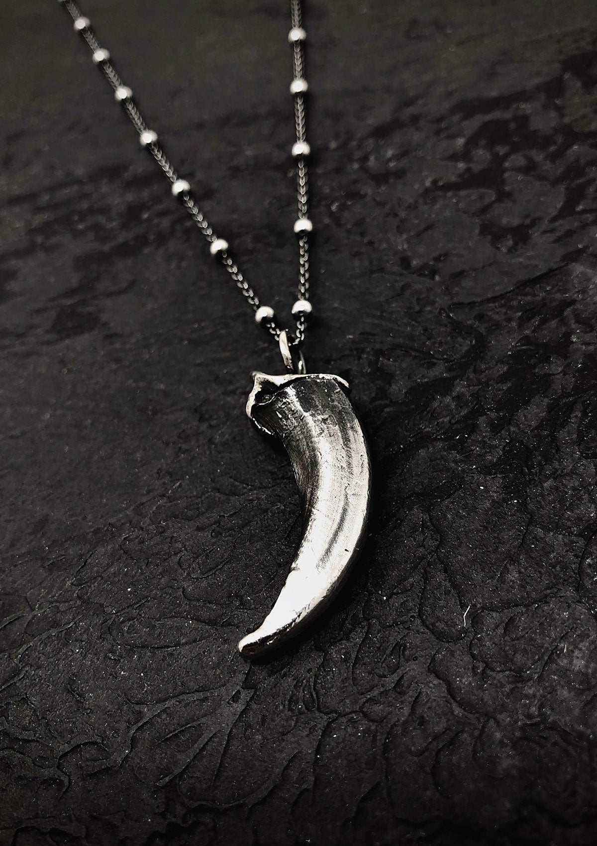 Wolf necklace, wolf claw pendant. Wolf talisman. Gift for wolf lovers. 