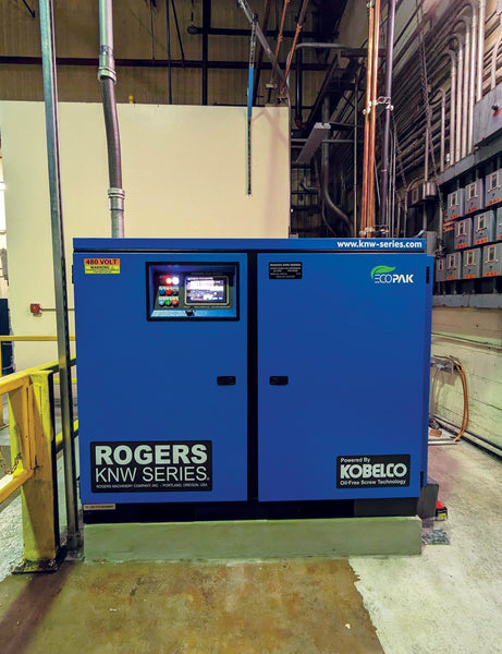 an air compressor sits in a warehouse