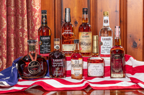 bottles of Laird's brandy sit on an American flag