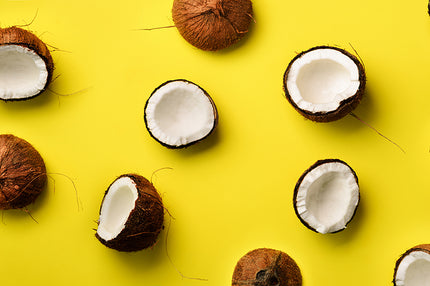 Halved coconuts prior to processing to produce MCTs