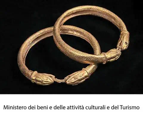 Armilla bracciale a forma di serpente in argento 925 e oro 18K.