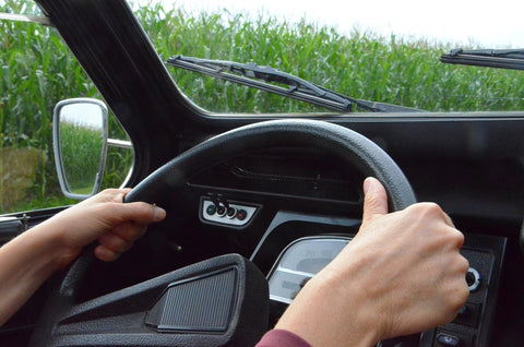 hands on the steering wheel