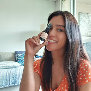 Women showing Vitamin C Serum