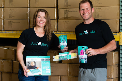 Beth Fynbo and Eric Fynbo with Busy Baby products
