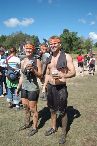 Beth Fynbo and Eric Fynbo after finishing a Tough Mudder