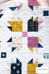 Lou orth Designs Paw Tracks quilt pattern using Ruby Star Society fabrics
