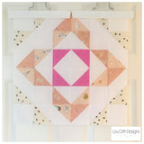Charmed quilt pattern. Pink Scrappy HST quilt block by Lou Orth