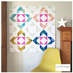 Charmed quilt pattern by Lou Orth. Modern baby quilt