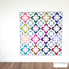 Charmed large lap quilt by Lou Orth. Modern quilt pattern