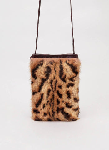 Bolso móvil para mujer con pelo estampado animal print en tono marrón