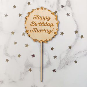 photograph of Wooden star cake topper by The Crafty Stag
