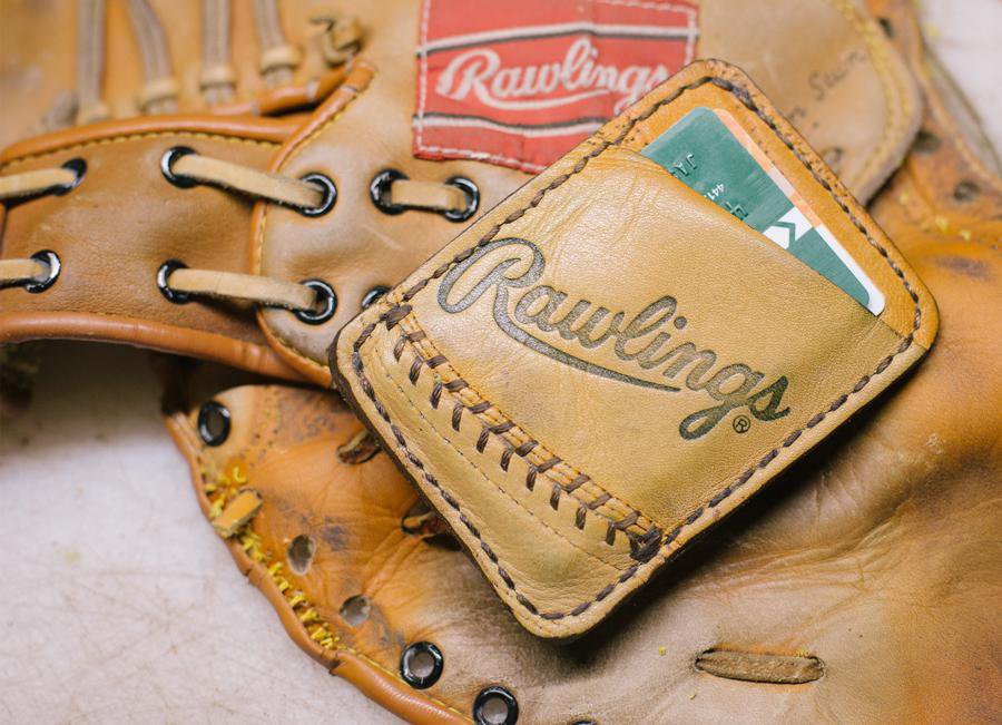 Keep cards and cash secure in a stylish baseball glove leather wallet