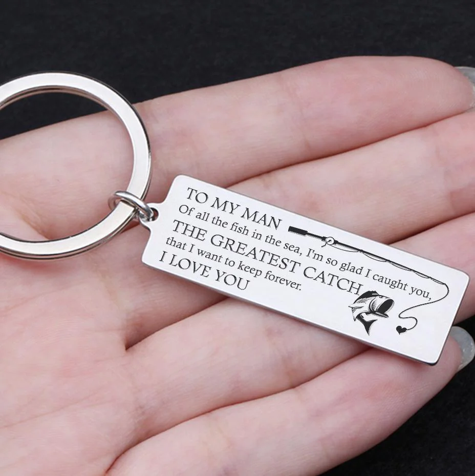 Declare him your greatest catch on this keychain