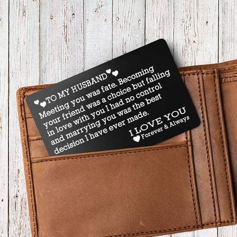 Engraved wallet card insert in a wallet for husband