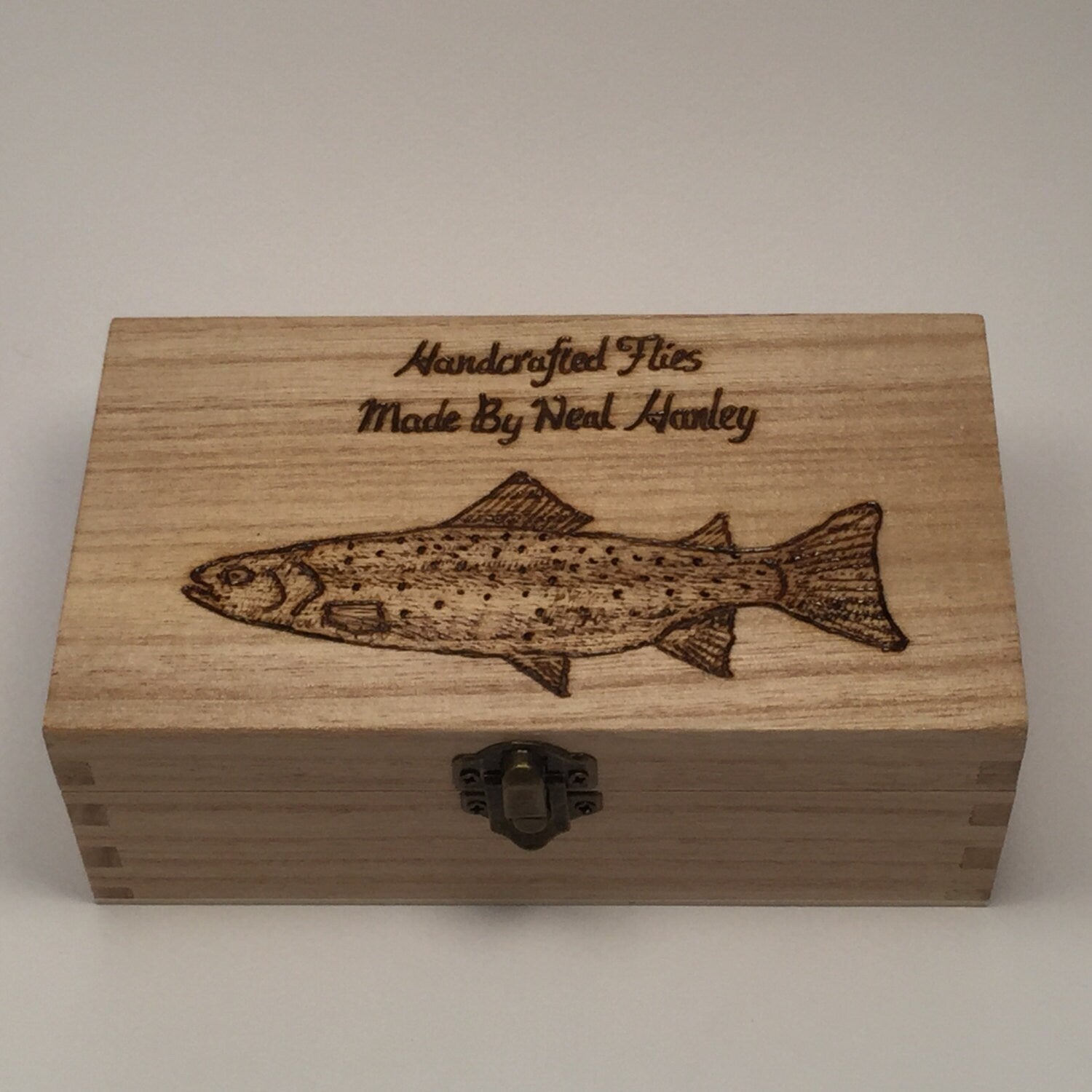 Treasure baits in a handcrafted wooden lure box