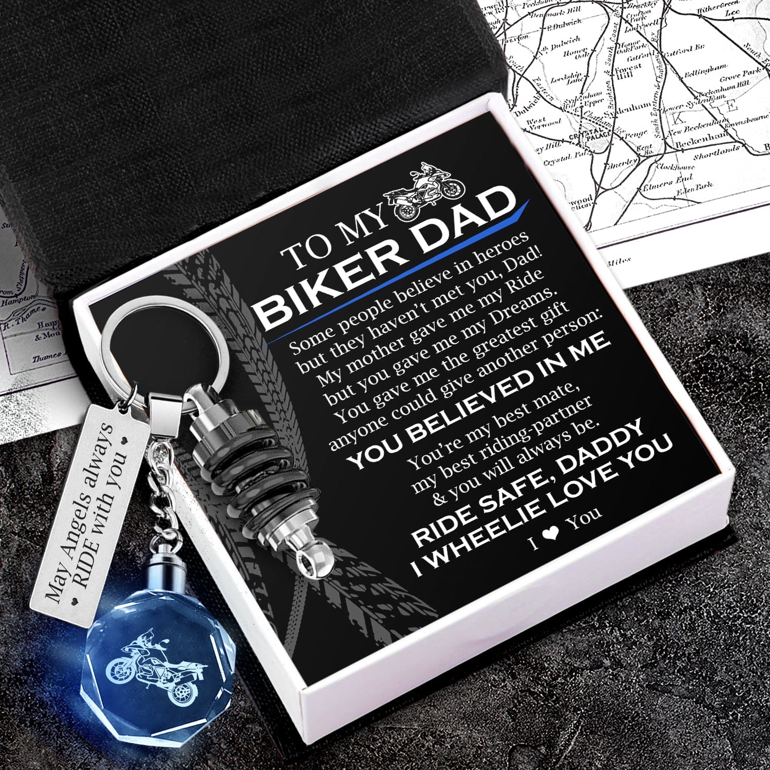 An LED light keychain with a special message for biker dads