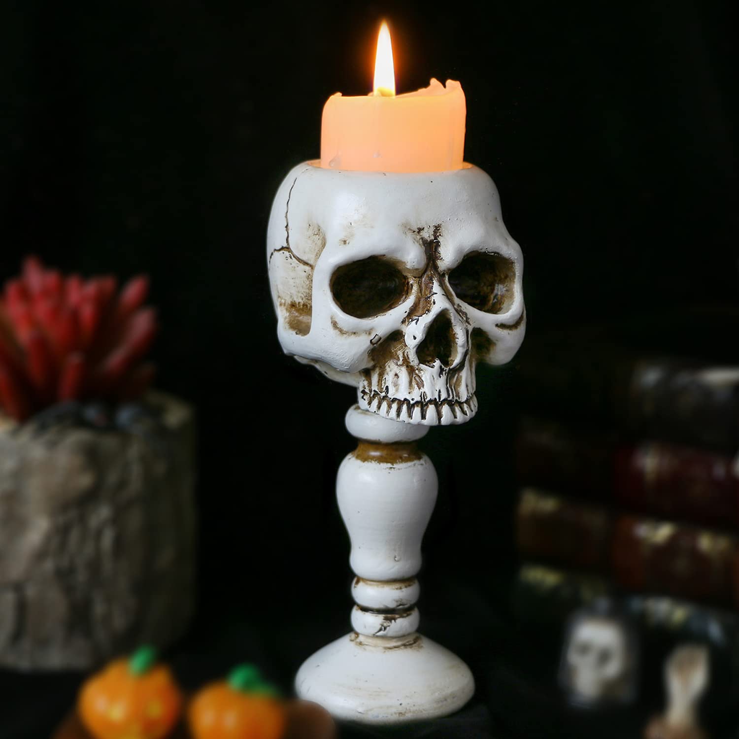 Decorative skull candles adding a gothic touch to any room