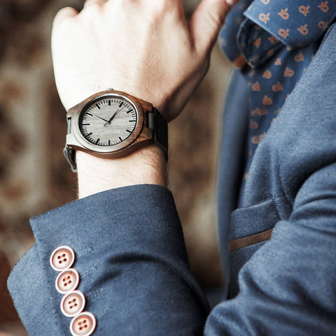 wooden watch on a man wrist