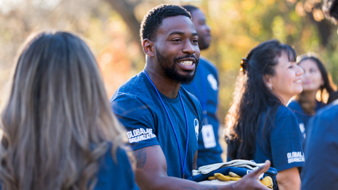 Handing out lanyards