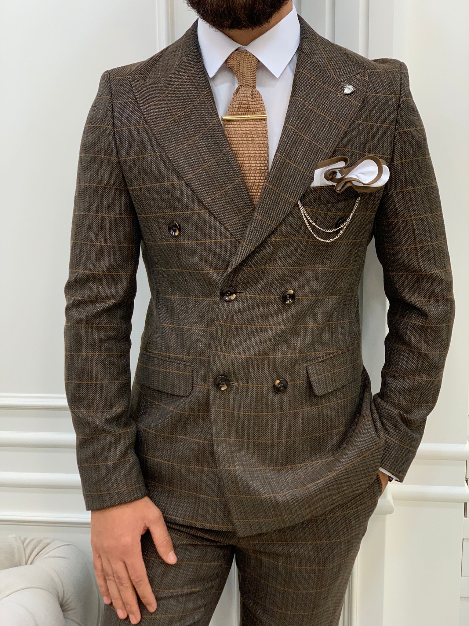 dark brown double breasted suit