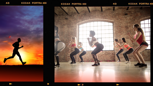 Group of women in a class doing squats next to a sunset with a person running