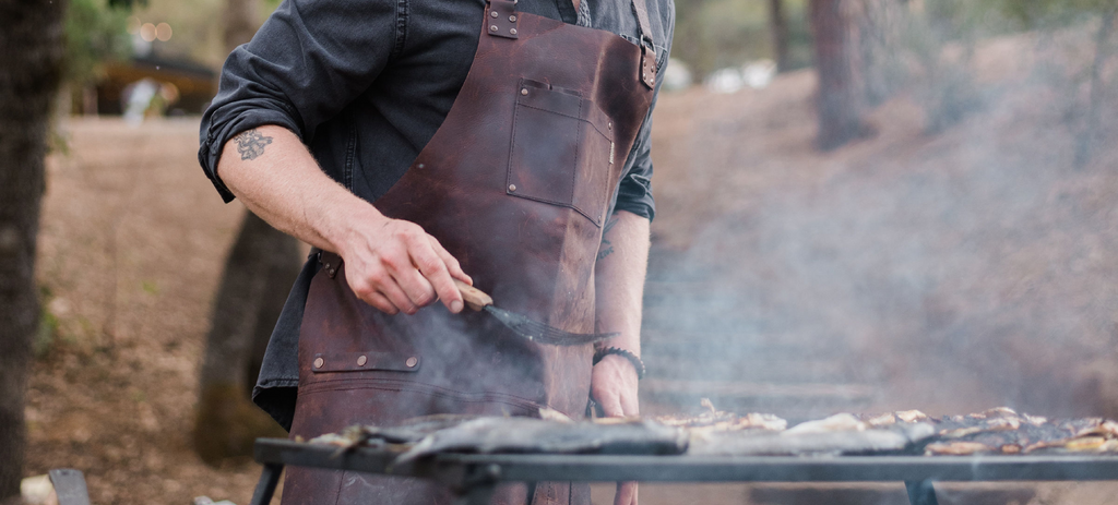 Grilling while wearing the Barebones Tradesman Leather Apron