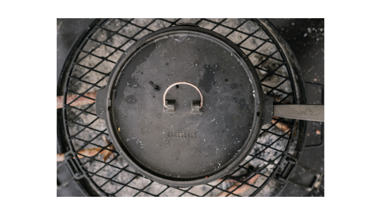 Barbones cast iron skillet on a grill grate