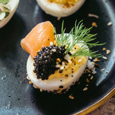 Deviled egg with California White Sturgeon caviar, Everything But the Bagel seasoning and, smoked salmon