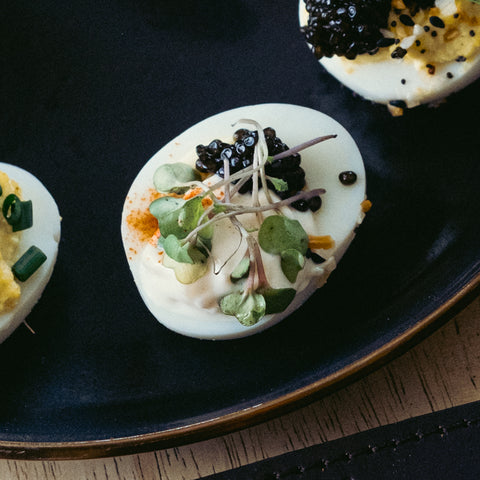 Deviled egg with Osetra Caviar and paprika