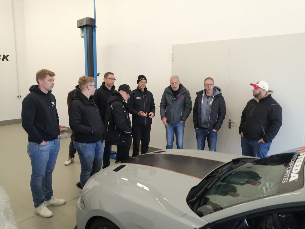 Cold and wet Steeda pit box crew in Q767 Bilsterberg track test